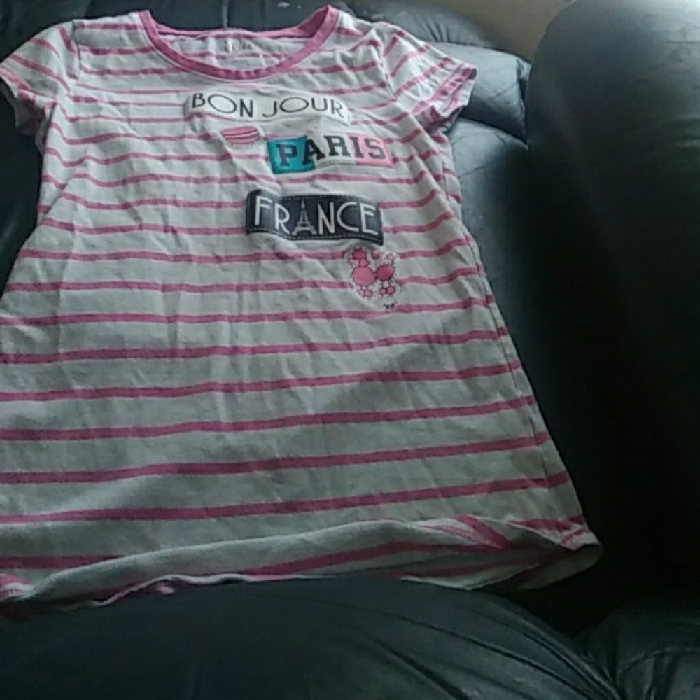 A pink justice tee